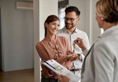 Rent-or-Own-Home-with-key-being-passed-small.jpg